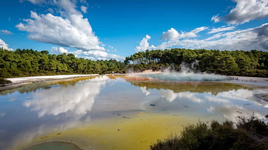 Auckland: Wai-O-Tapu, Maori Haka & Hot Springs Rotorua Tour - Wai-O-Tapu’s colored pools and sulfur air