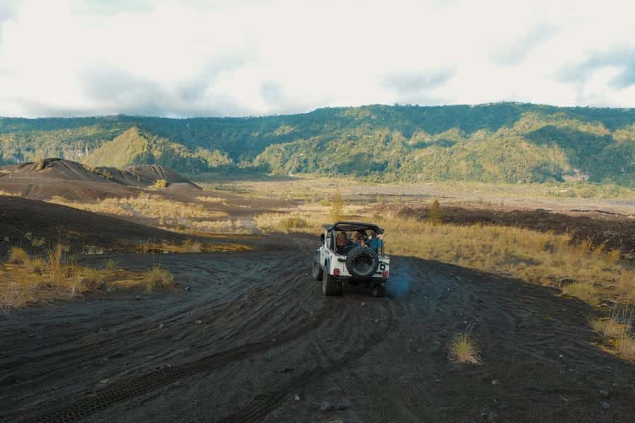 Bali: Day/Sunset Mount Batur 4WD Jeep and Natural Hot Spring - The Jeep Ride Across Lava and Black Sand