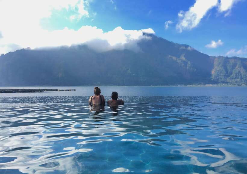 Bali: Sunset Mount Batur Jeep and Hot Spring All Inclusive - Sunset from the black-sand slopes