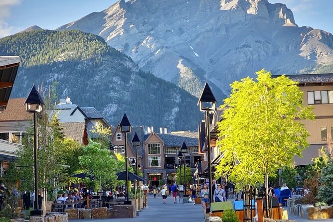 Banff Gondola Hot Springs Bow Falls and Three Lakes tour - The Banff sign is a quick photo stop