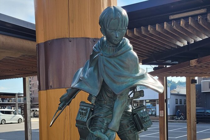 Deluxe Private Tour: Hita, AOT Statues and Onsen from Fukuoka - Jionnotaki Falls closes the route with nature