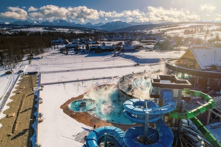 From Krakow: Snowmobile adventure and Thermal Baths tour - Snowmobile time in the Tatra Mountains