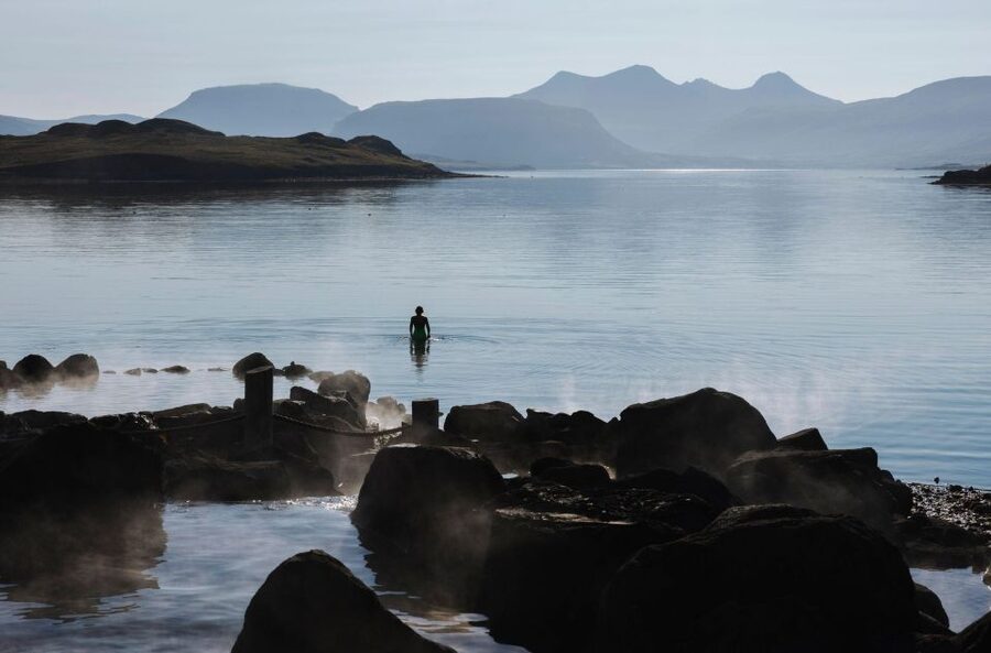From Reykjavik: Hvammsvík Hot Spring with Transportation - Changing rooms, steam room, and the swim-up bar