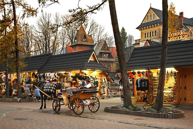 Krakow–Zakopane: Cable Car, Chocholow Baths, Cheese & Vodka - Chochołów: a quick look at old wooden houses