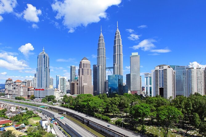Kuala Lumpur City Tour plus Batu Caves, Hot Springs & Waterfalls - Batu Caves and the 272-step climb