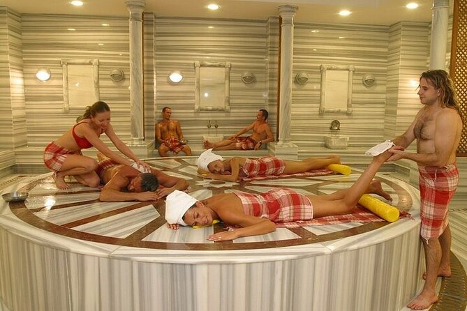 Kusadasi Half Day Walking Tour and Turkish Bath Experience - Guide service and group style