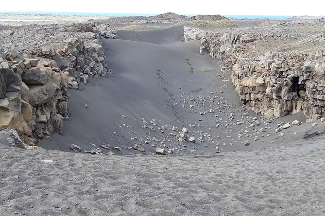 Lava, Craters and Hot Springs Private Tour - Brimketill: waves working on old lava
