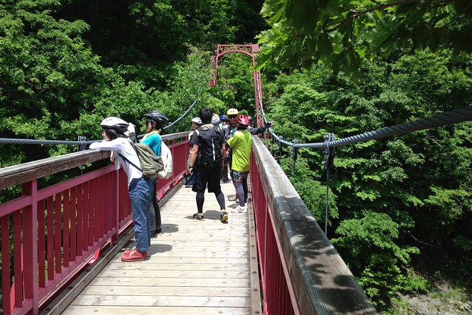 Mountain Bike Tour from Sapporo Including Hoheikyo Onsen and Lunch - Jozankei stops and the red-bean snack