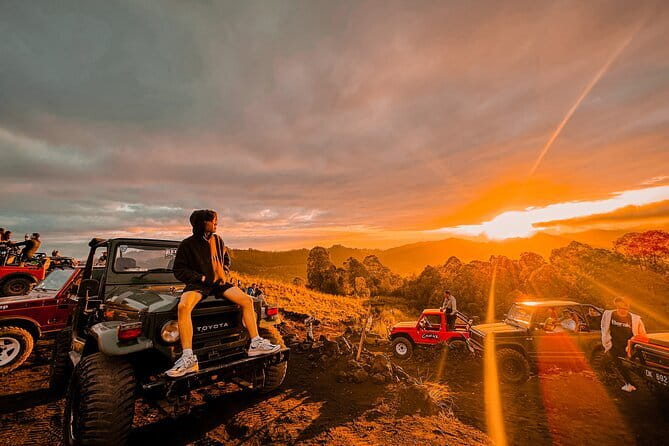 Mt Batur Sunrise Jeep & Natural Hot Spring Tour - Sunrise over Lake Batur and Mount Abang