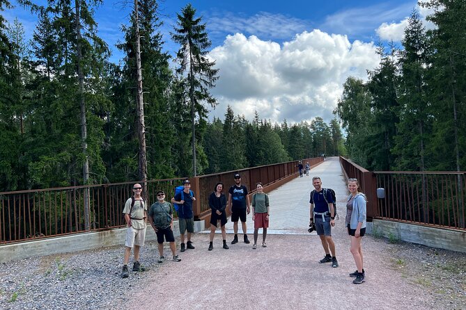 National Park Hike & Finnish Smoke Sauna Experience with Campfire Lunch - Campfire lunch by the lake