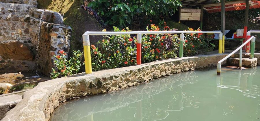 Roseau: Titou Gorge, Hot Spring, Falls & Champagne Reef Tour - Soaking at Tia Hot Spa