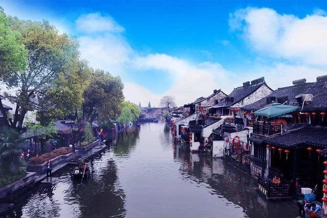 Xitang Water Town Private Tour from Shanghai with Hot Spring Spa Experience - Stone bridges, gardens, and colorful lanes
